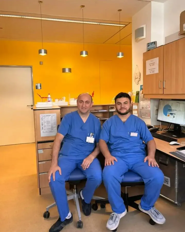 Dr. Rufat Asadbeyli with a medical student visiting the clinic